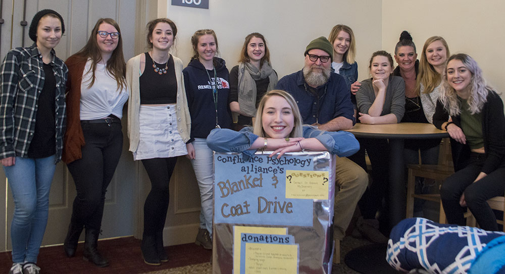Pictured are psychology undergraduate students at their blanket and coat drive for the homeless.